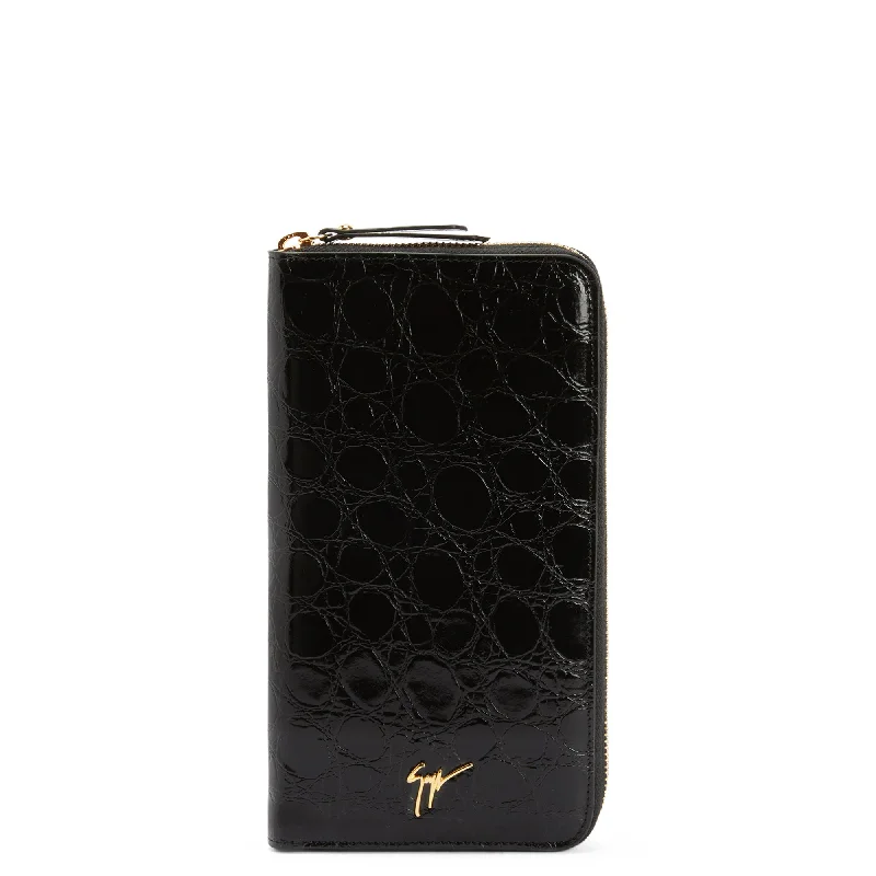 Vintage-style money clips for collectors Vintage-Style Passport Covers & Wallets with Brass Hardware for Retro EnthusiastsGiuseppe Zanotti Samuel