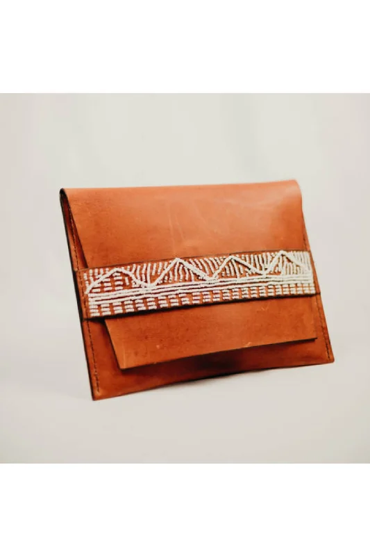 Top-rated money clips for everyday use Vintage-Style Passport Covers & Wallets with Brass Hardware for Retro EnthusiastsTaino Clutch