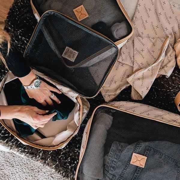Eco-friendly money clips made from sustainable materials Laser-Cut Metal Passport Covers & Wallets with Geometric Designs for Tech-SavvyThandana Travel Luggage Organizer Pods - Thandana Logo 6 Piece Set