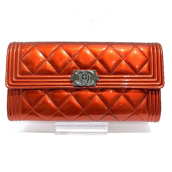 Money clips for women with sleek designs Chanel Boy Matelasse Bifold Wallet